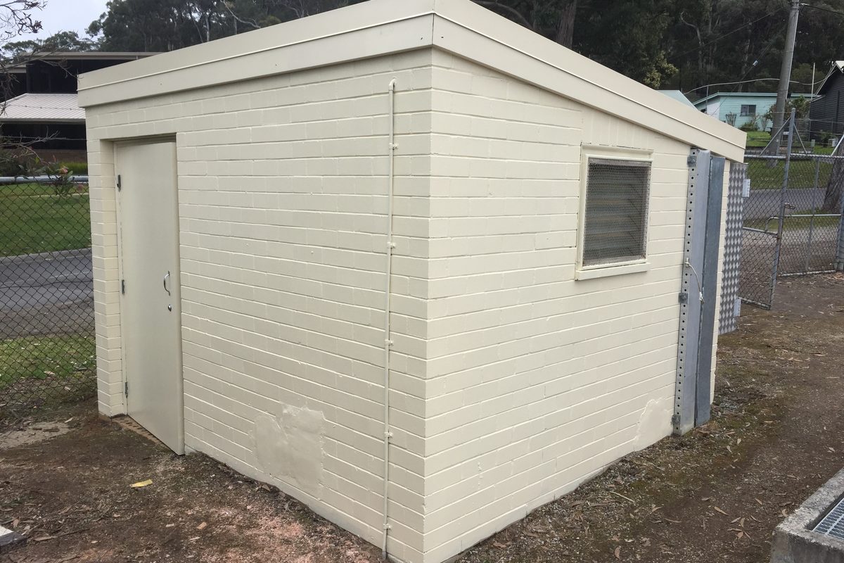 Small commercial building re-clad and painted