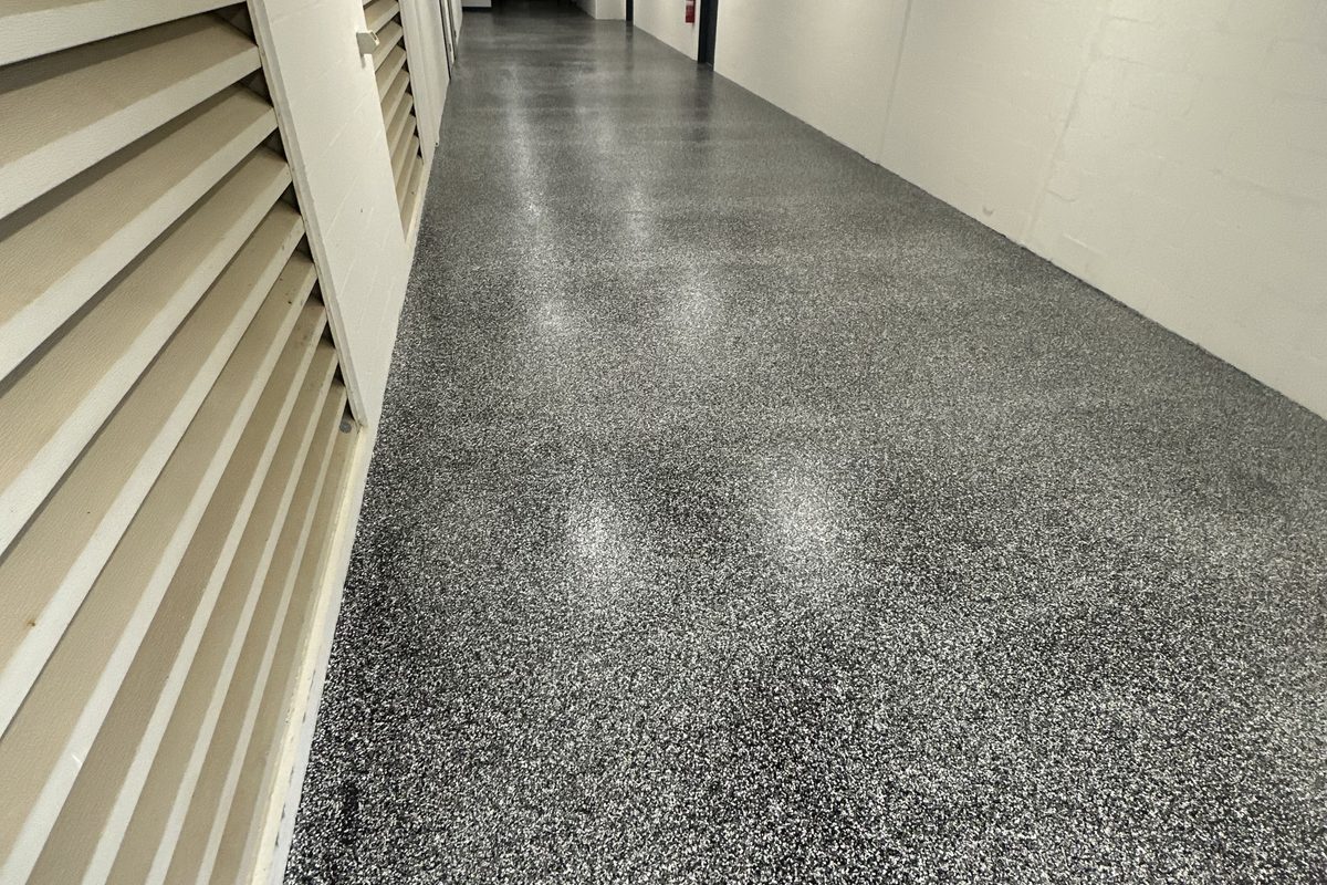 New epoxy floor coating in a commercial corridor