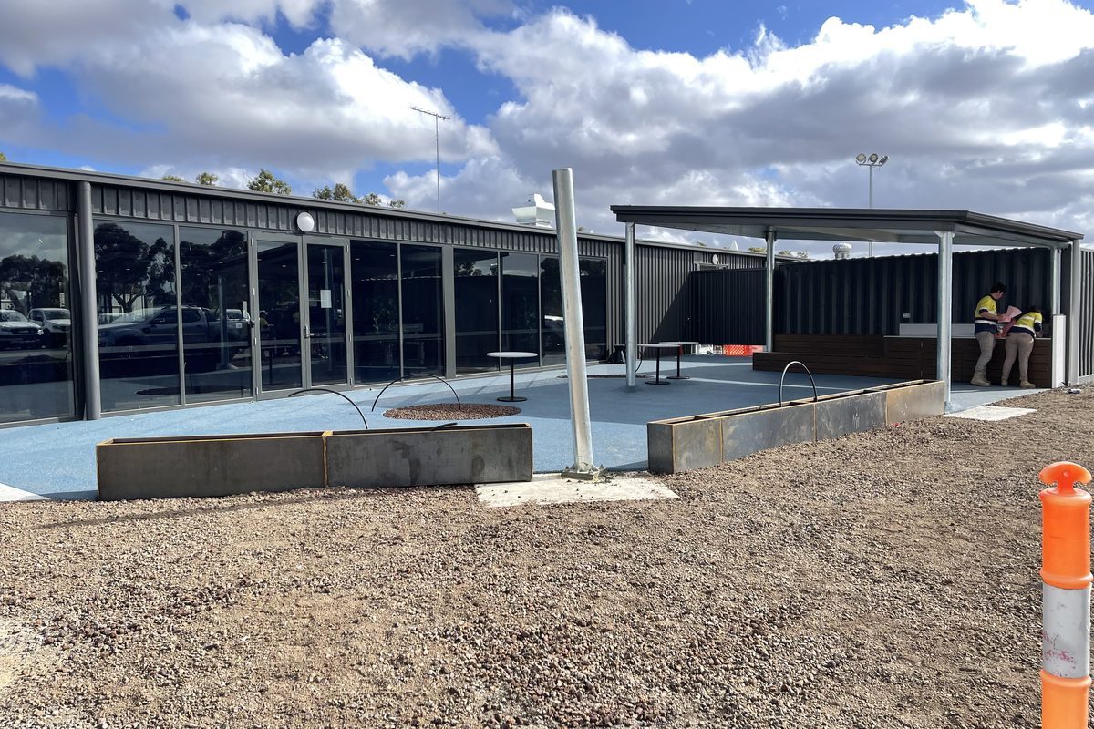 Commercial outdoor shelter and seating area maintained by JFM
