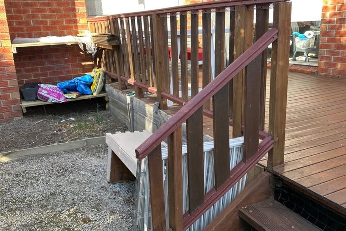 Weathered old balustrade and stair rail on a Highton deck before JFM rebuilt it
