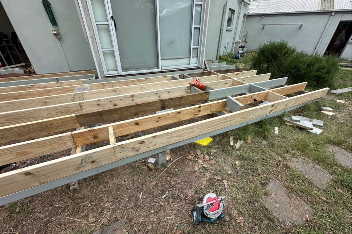 New treated pine deck frame on stumps during a full deck rebuild in Lara