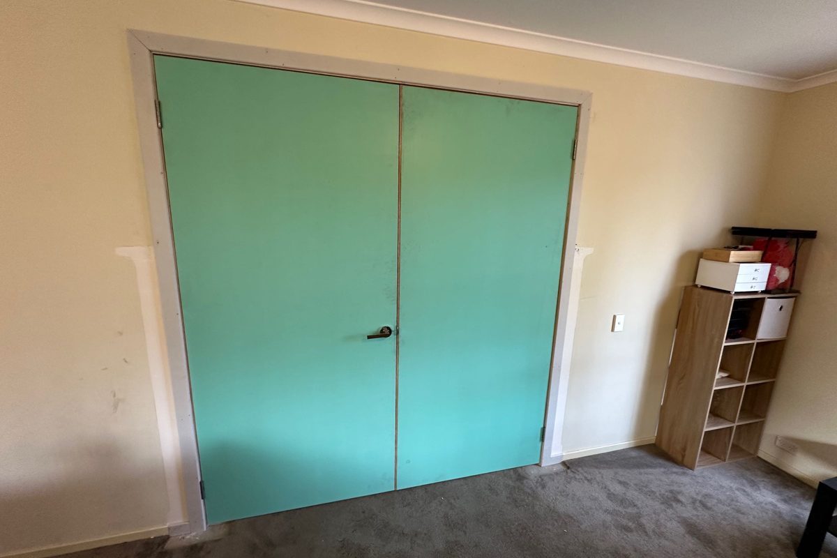 Double doors fitted to fill a wide opening between two rooms