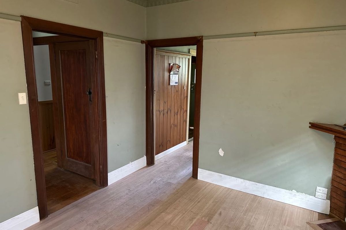 Period interior with timber doors, architraves and floors restored