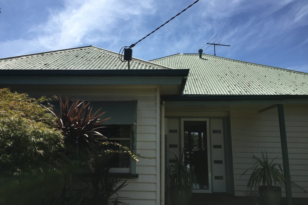 Weatherboard home repaired and repainted by JFM