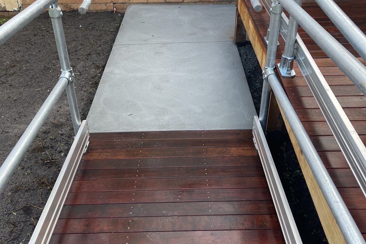 Timber ramp boards between galvanised steel tube rails, built by JFM