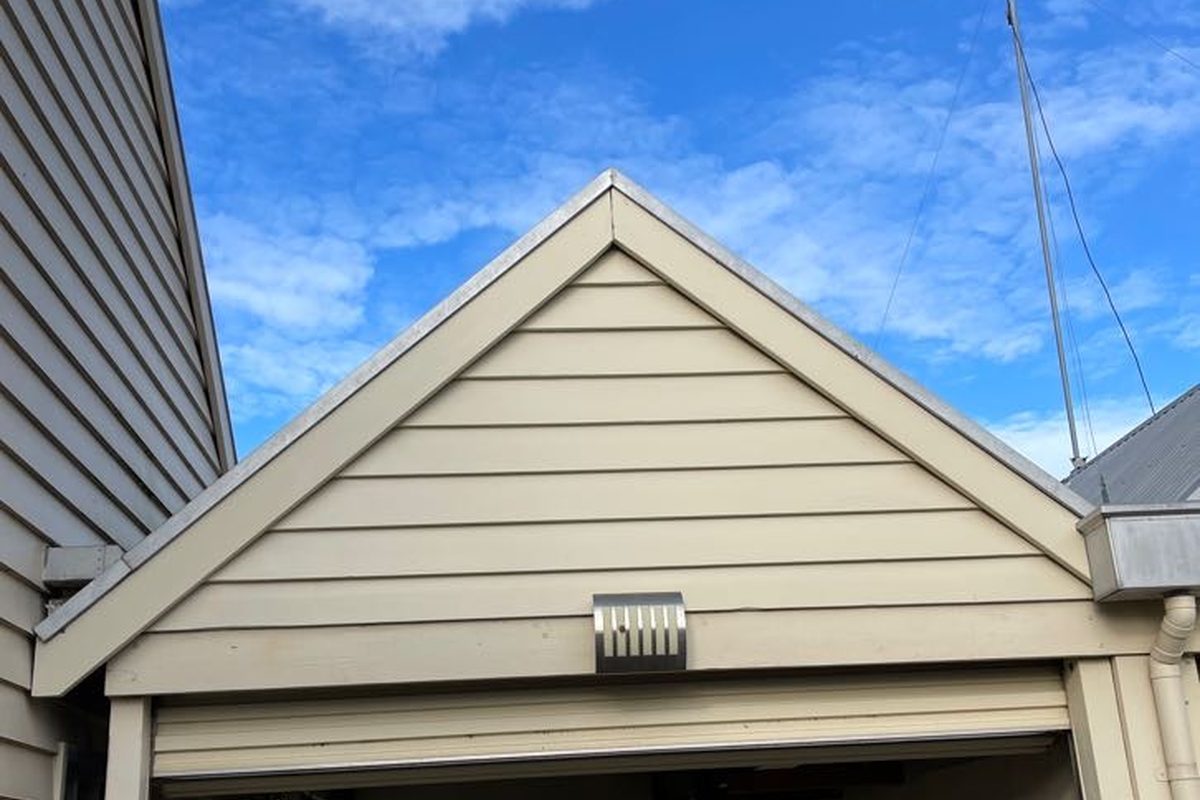Weatherboards above a garage replaced and painted in South Geelong