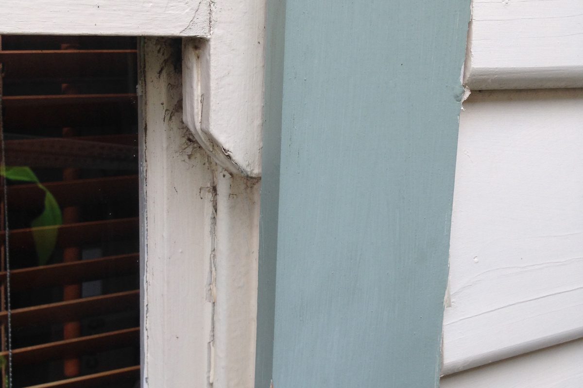 Same window jamb repaired with new timber and painted