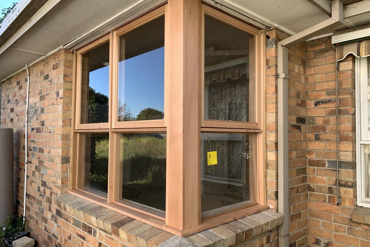 New timber corner window fitted into a brick wall by JFM