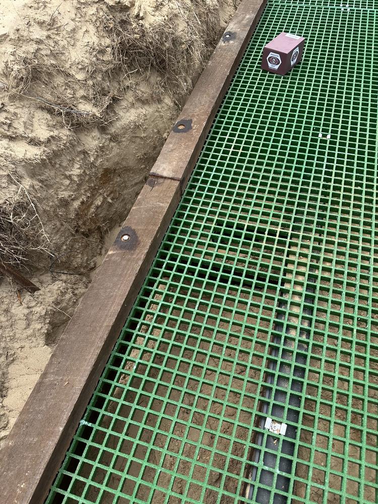 The Australian hardwood frame with an open-mesh walking surface