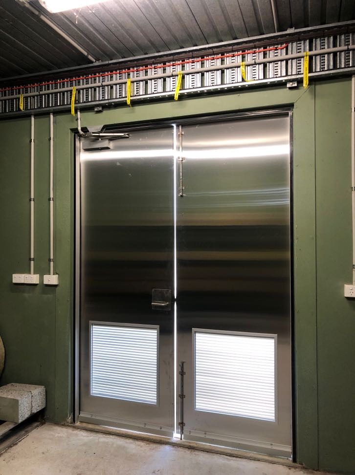 New polished 316 stainless steel double doors, interior side